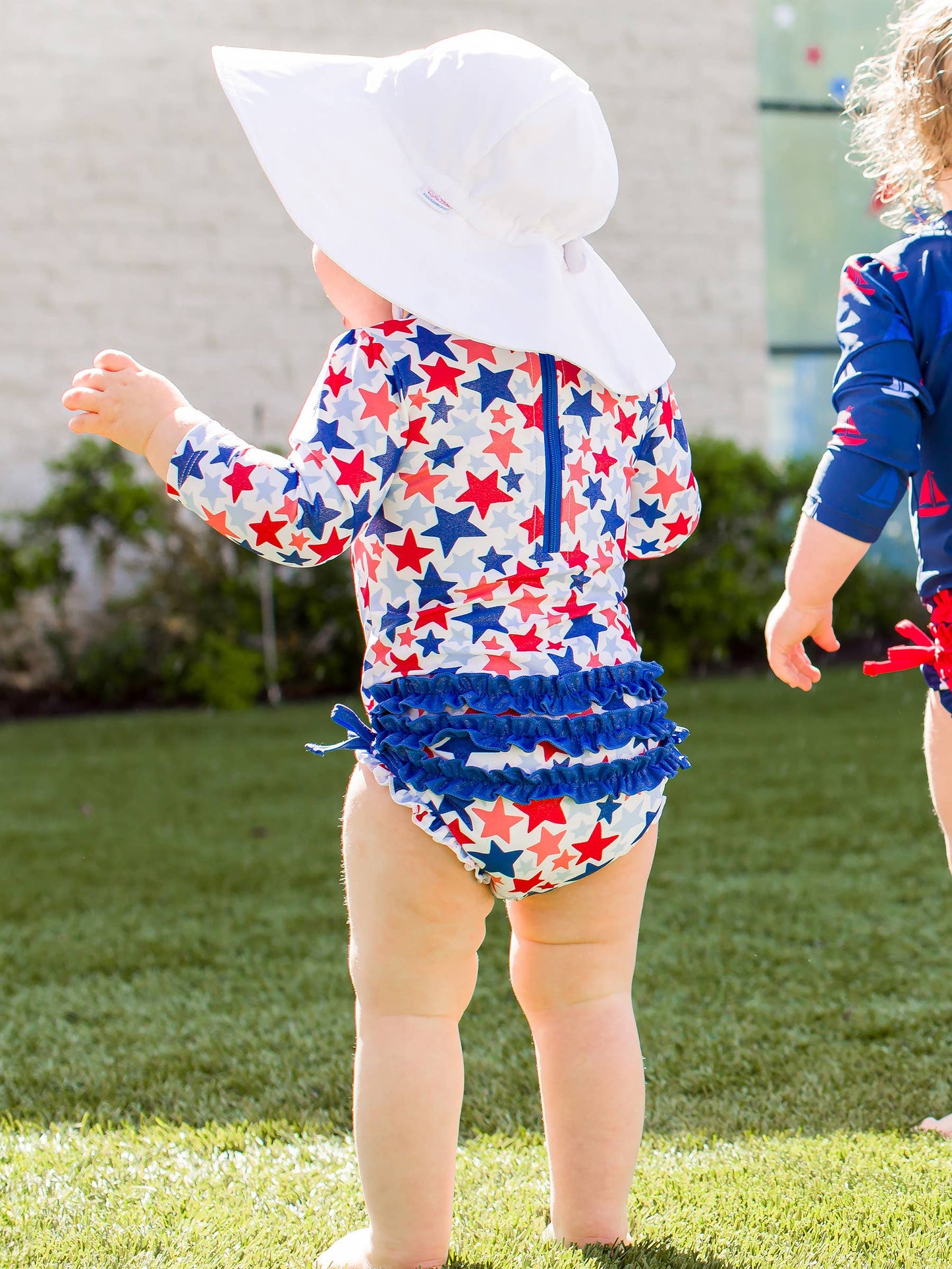 Baby Girls Shimmer Star-Spangled Long Sleeve One Piece Rash Guard Swimsuit with Signature Rear Ruffles