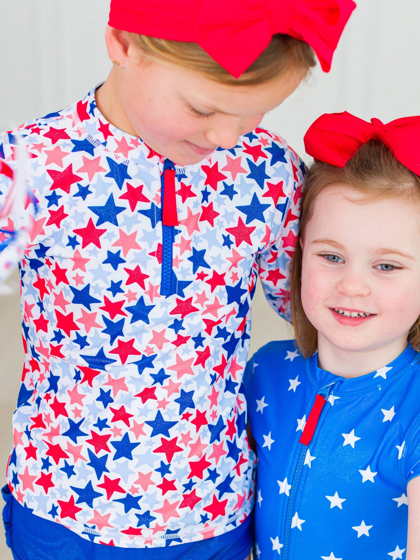 Girls Shimmer Star-Spangled Long Sleeve Zipper Rash Guard 2-Piece Swimsuit with Signature Rear Ruffles