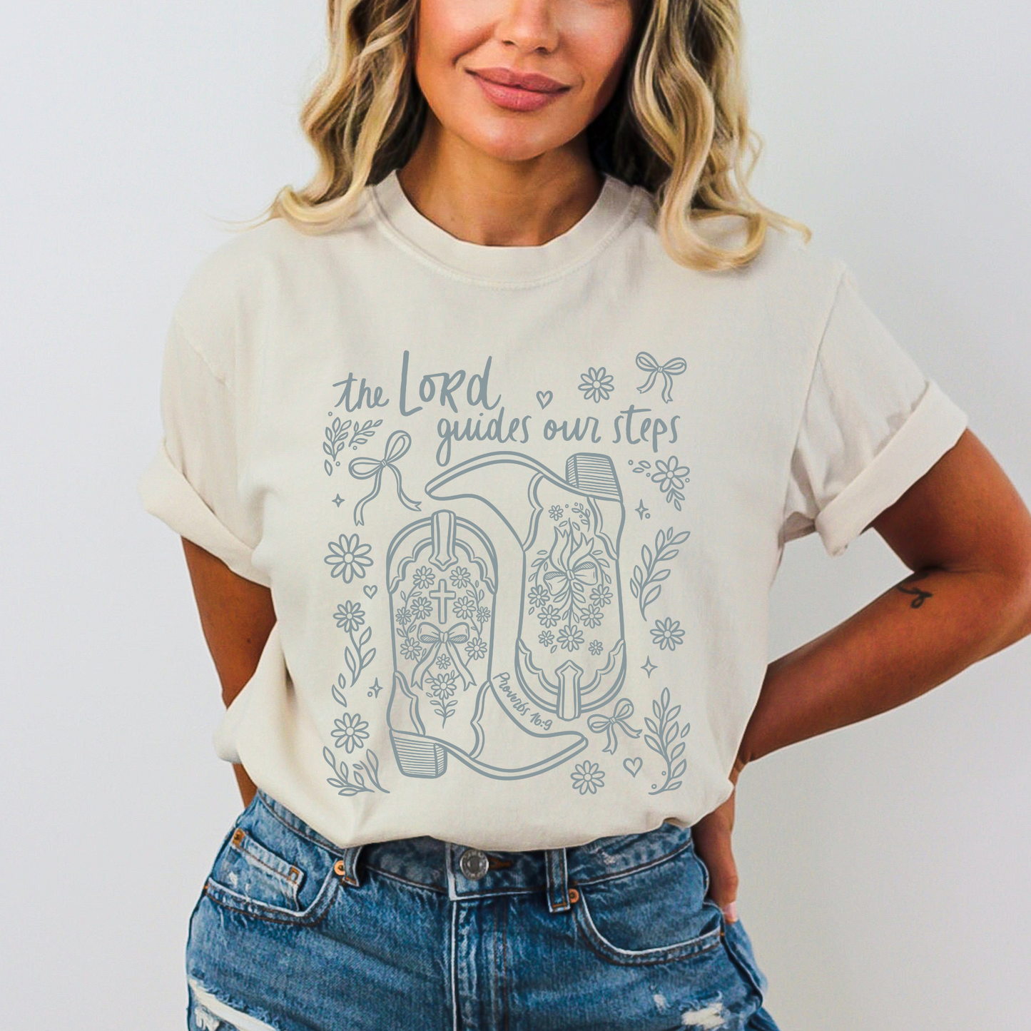 The Lord Guides Our Steps Cowboy Boot Christian Graphic Tee