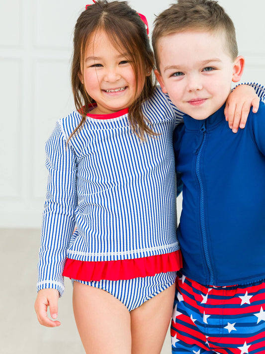 Girls Blue Seersucker Long Sleeve Rash Guard 2-Piece Swimsuit with Signature Rear Ruffles