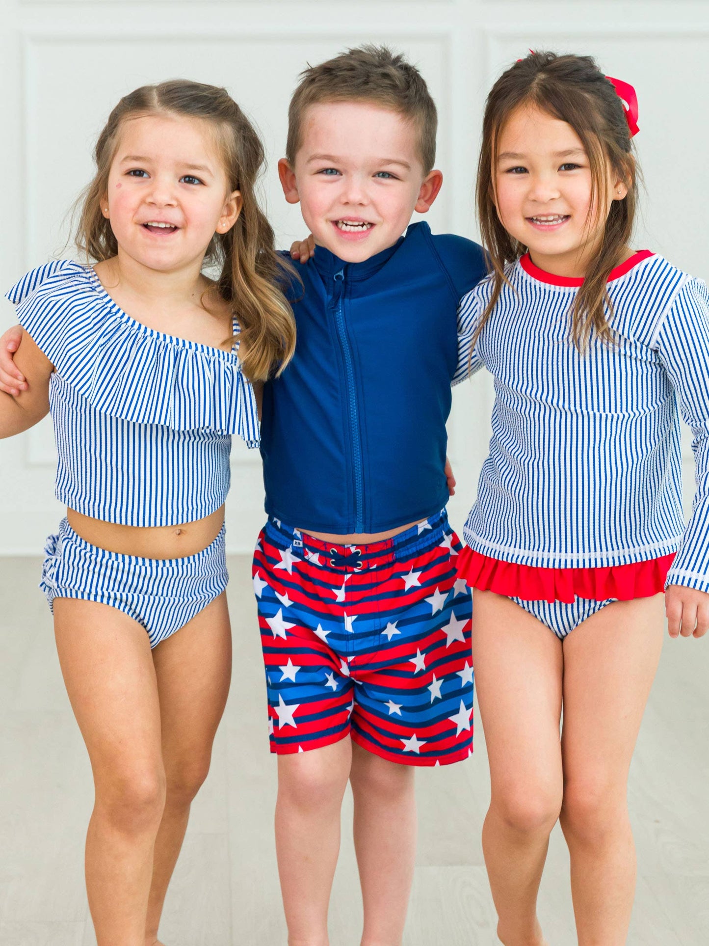 Girls Blue Seersucker Long Sleeve Rash Guard 2-Piece Swimsuit with Signature Rear Ruffles