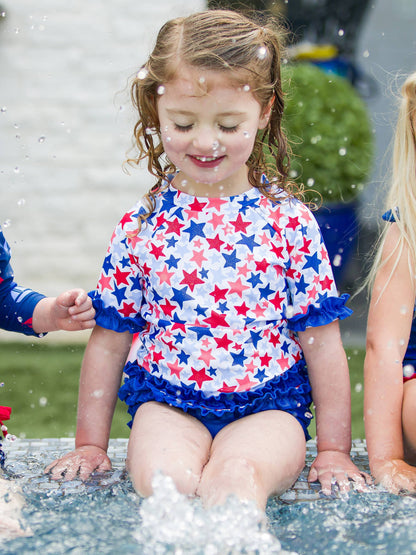 Girls Shimmer Star-Spangled Classic Short Sleeve Rash Guard 2-Piece Swimsuit with Signature Rear Ruffles